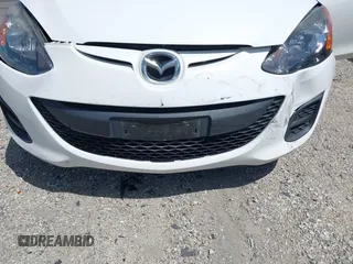 2014 Mazda 2 Sport with VIN JM1DE1KZ5E0171550, listed as a IAAI auction lot 41957824 with 70,838 mi miles and . Bid and sale history available at DreamBid. Image 6.