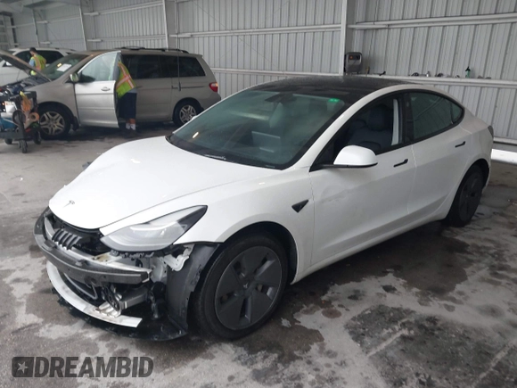 2023 Tesla Model 3 with VIN 5YJ3E1EA9PF548726, listed as a IAAI auction lot 42345157 with 30,647 mi miles and . Bid and sale history available at DreamBid. Image 18.