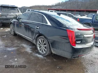 2017 Cadillac XTS Luxury z VIN 2G61M5S36H9111282, wystawiony jako IAAI lot #41107706 z przebiegiem 136 286 mil mil oraz . Historia ofert i sprzedaży dostępna na DreamBid. Obrazek 3.