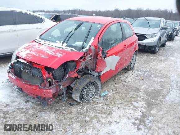 2011 Toyota Yaris with VIN JTDJT4K34B5329980, listed as a IAAI auction lot 41393540 with 84,987 mi miles. Bid and sale history available at carsss.com. Image 2.