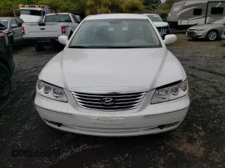 2010 Hyundai Azera GLS z VIN KMHFC4DD4AA513796, wystawiony jako Copart lot #59782965 z przebiegiem 56 958 mil mil oraz Szkoda całkowita • Salvage title. Historia ofert i sprzedaży dostępna na DreamBid. Obrazek 5.