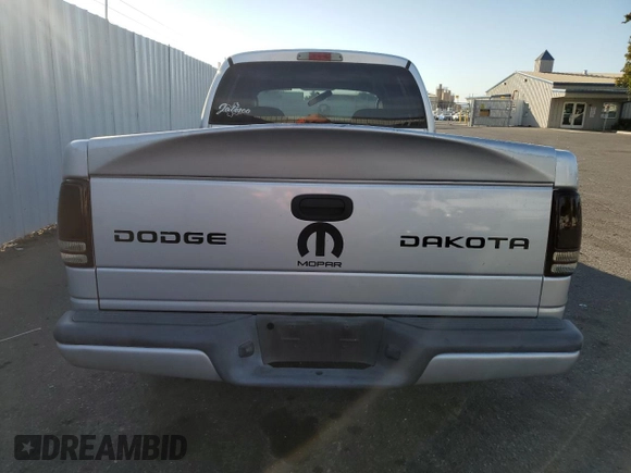 2004 Dodge Dakota Sport with VIN 1D7HL38N44S573883, listed as a Copart auction lot 74955984 with 165,510 mi miles and Salvage Title. Bid and sale history available at carsss.com. Image 6.