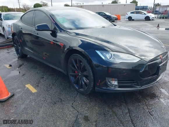 2013 Tesla Model S Performance with VIN 5YJSA1DP7DFP07039, listed as a IAAI auction lot 41764077 with 104,038 mi miles. Bid and sale history available at carsss.com. Image 1.