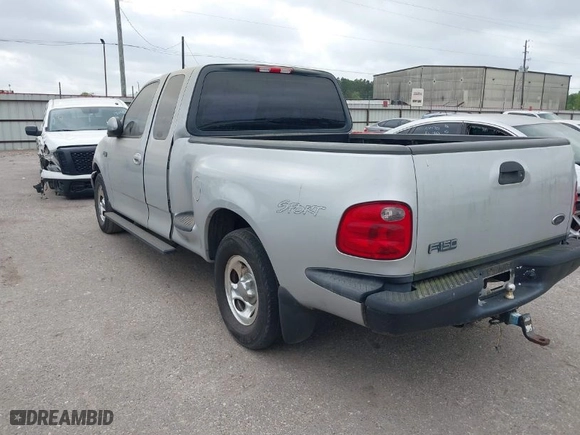 2003 Ford F-150 XL with VIN 1FTRX07253KB95404, listed as a IAAI auction lot 41945734 with 1 mi miles. Bid and sale history available at carsss.com. Image 3.