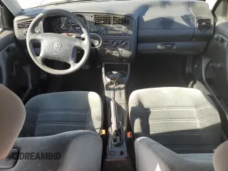1998 Volkswagen Jetta z VIN 3VWRB81H3WM156525, wystawiony jako Copart lot #42262735 z przebiegiem 83 473 mil mil oraz Czysty tytuł • Clean title. Historia ofert i sprzedaży dostępna na DreamBid. Obrazek 8.