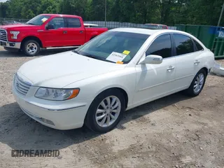 2007 Hyundai Azera SE z VIN KMHFC46F07A176082, wystawiony jako IAAI lot #42163164 z przebiegiem 146 021 mil mil oraz . Historia ofert i sprzedaży dostępna na DreamBid. Obrazek 2.