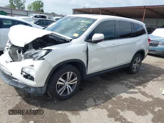 2017 Honda Pilot EX-L with VIN 5FNYF6H5XHB005000, listed as a IAAI auction lot 42039832 with 141,592 mi miles and . Bid and sale history available at DreamBid. Image 2.