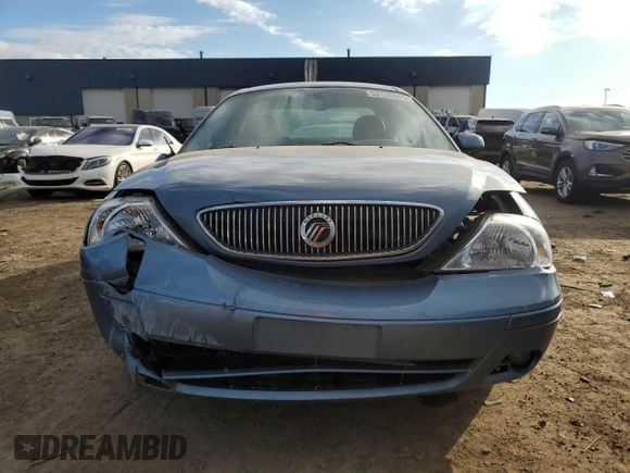 2005 Mercury Sable LS z VIN 1MEFM55S15A634567, wystawiony jako Copart lot #53136945 z przebiegiem 85 396 mil mil oraz Szkody całkowita. Historia ofert i sprzedaży dostępna na DreamBid. Obrazek 5.