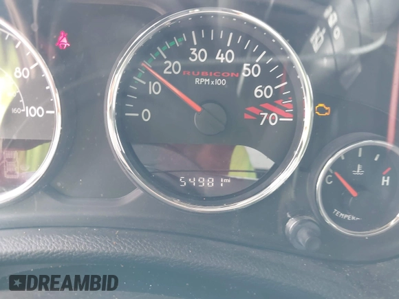 2015 Jeep Wrangler Unlimited Rubicon z VIN 1C4BJWFG2FL572417, wystawiony jako IAAI lot #41895927 z przebiegiem 54 981 mil mil oraz . Historia ofert i sprzedaży dostępna na DreamBid. Obrazek 7.