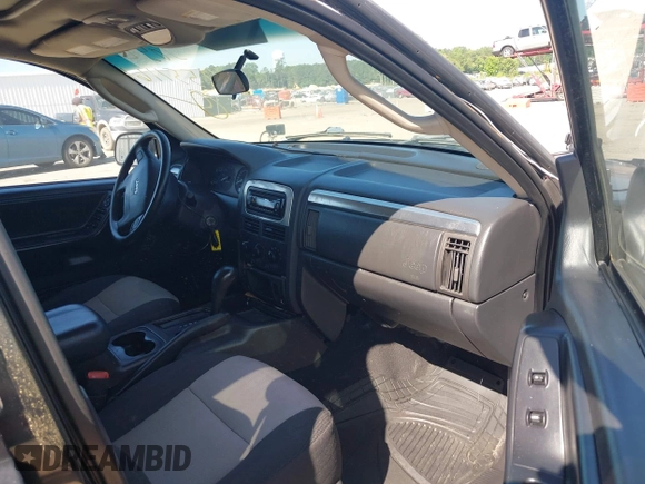 2004 Jeep Grand Cherokee Laredo z VIN 1J4GX48S04C281660, wystawiony jako IAAI lot #42551161 z przebiegiem 173 209 mil mil oraz . Historia ofert i sprzedaży dostępna na DreamBid. Obrazek 5.