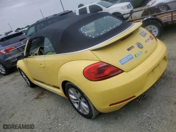 2013 Volkswagen Beetle Convertible 2.0L TDI w/Sound/Nav with VIN 3VW5L7AT7DM829744, listed as a Copart auction lot 74470404 with 0 mi miles and Salvage Title. Bid and sale history available at carsss.com. Image 2.