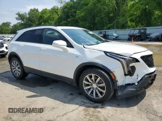 2023 Cadillac XT4 AWD Sport с VIN 1GYFZFR46PF209320, выставлен на аукционе Copart как лот 55662565 с пробегом 25 665 миль миль и Списание • Salvage title. История ставок и продаж доступна на DreamBid. Изображение 4.