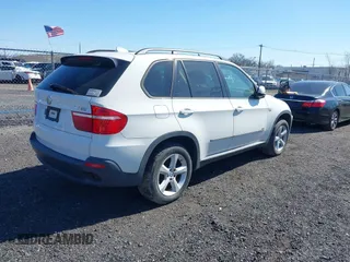 2008 BMW X5 3.0si with VIN 5UXFE43528L023170, listed as a IAAI auction lot 41892624 with 154,544 mi miles. Bid and sale history available at carsss.com. Image 4.