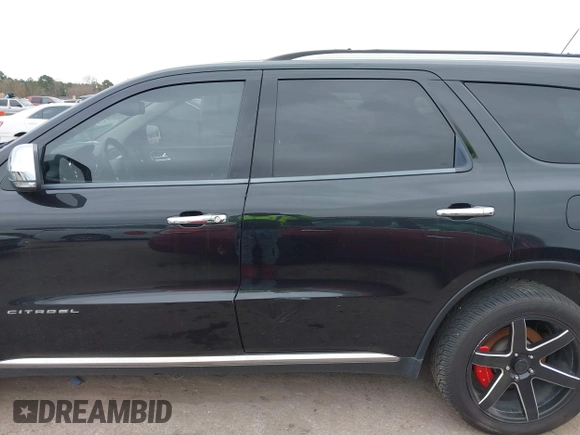 2011 Dodge Durango Citadel with VIN 1D4SE5GTXBC695700, listed as a IAAI auction lot 41381731 with 152,055 mi miles. Bid and sale history available at carsss.com. Image 14.