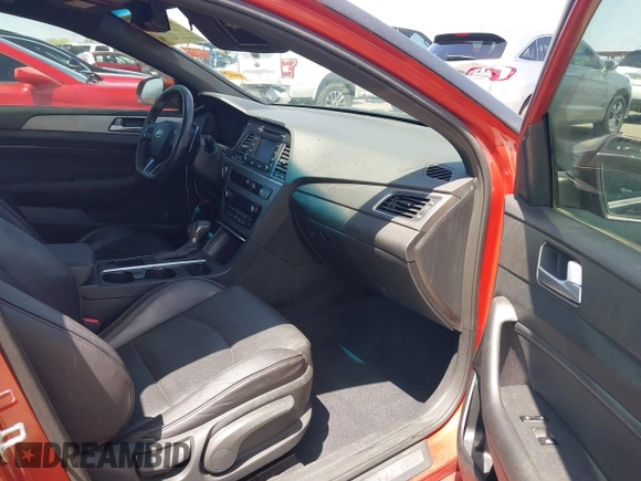 2015 Hyundai Sonata Sport with VIN 5NPE34ABXFH084893, listed as a IAAI auction lot 42066253 with 122,923 mi miles and . Bid and sale history available at carsss.com. Image 5.