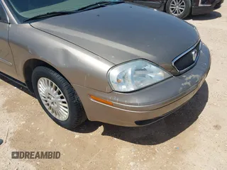 2003 Mercury Sable GS z VIN 1MEFM50U23A601955, wystawiony jako IAAI lot #42197171 z przebiegiem 94 977 mil mil oraz . Historia ofert i sprzedaży dostępna na DreamBid. Obrazek 6.