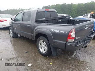 2014 Toyota Tacoma PreRunner with VIN 5TFJU4GN7EX052421, listed as a IAAI auction lot 42360951 with 166,175 mi miles and . Bid and sale history available at DreamBid. Image 3.