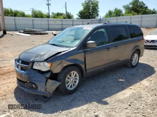 2018 Dodge Grand Caravan SXT z VIN 2C4RDGCGXJR298769, wystawiony jako Copart lot #56584415 z przebiegiem 128 198 mil mil oraz Szkoda całkowita • Salvage title. Historia ofert i sprzedaży dostępna na DreamBid. Obrazek 1.