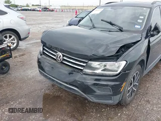 2021 Volkswagen Tiguan SE z VIN 3VV3B7AX7MM004286, wystawiony jako IAAI lot #39864219 z przebiegiem 67 429 mil mil oraz . Historia ofert i sprzedaży dostępna na DreamBid. Obrazek 6.