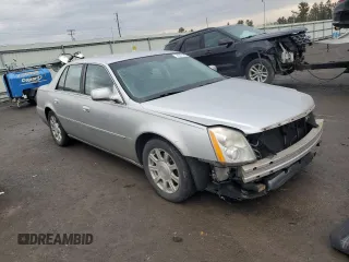 2010 Cadillac DTS 1SA z VIN 1G6KA5EY0AU125918, wystawiony jako Copart lot #45471305 z przebiegiem 56 685 mil mil oraz Szkoda całkowita • Salvage title. Historia ofert i sprzedaży dostępna na DreamBid. Obrazek 4.