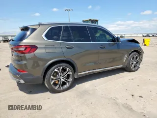 2023 BMW X5 xDrive40i with VIN 5UXCR6C01P9P27041, listed as a Copart auction lot 59009585 with 45,568 mi miles and Salvage title. Bid and sale history available at DreamBid. Image 3.