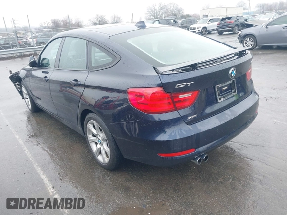 2015 BMW 3 Series 328i Gran Turismo xDrive with VIN WBA3X5C5XFD562161, listed as a IAAI auction lot 41570204 with 71,405 mi miles and . Bid and sale history available at DreamBid. Image 3.