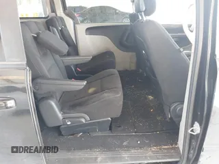 2012 Dodge Grand Caravan SE with VIN 2C4RDGBG9CR351921, listed as a IAAI auction lot 42110545 with 89,194 mi miles and . Bid and sale history available at DreamBid. Image 8.