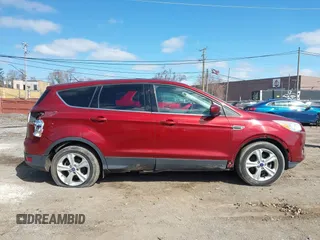 2016 Ford Escape SE with VIN 1FMCU0G75GUB22209, listed as a IAAI auction lot 41864084 with 96,313 mi miles. Bid and sale history available at carsss.com. Image 13.