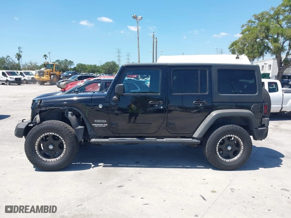 2013 Jeep Wrangler Unlimited Sport with VIN 1C4BJWDG7DL583686, listed as a IAAI auction lot 42037650 with 122,408 mi miles. Bid and sale history available at carsss.com. Image 15.
