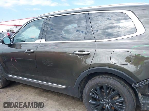 2022 Kia Telluride SX with VIN 5XYP54HC4NG271392, listed as a IAAI auction lot 42019407 with 50,971 mi miles and . Bid and sale history available at DreamBid. Image 14.