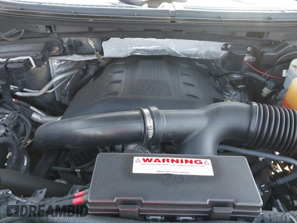 2014 Ford F-150 XL with VIN 1FTFW1ETXEFB51711, listed as a IAAI auction lot 42075381 with 238,603 mi miles. Bid and sale history available at carsss.com. Image 10.