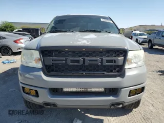 2004 Ford F-150 XLT with VIN 1FTPX14584NA82865, listed as a Copart auction lot 64094845 with 218,027 mi miles and Salvage title. Bid and sale history available at DreamBid. Image 5.