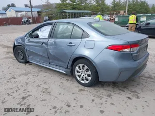 2020 Toyota Corolla LE with VIN JTDEPRAEXLJ001297, listed as a IAAI auction lot 41880882 with 76,407 mi miles. Bid and sale history available at carsss.com. Image 3.