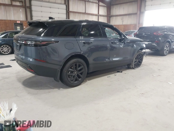 2025 Land Rover Range Rover Velar S with VIN SALYJ2EX4SA811596, listed as a IAAI auction lot 42052565 with 645 mi miles and . Bid and sale history available at DreamBid. Image 4.