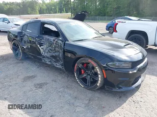 2017 Dodge Charger SRT Hellcat z VIN 2C3CDXL91HH638581, wystawiony jako IAAI lot #42088475 z przebiegiem 42 192 mil mil oraz . Historia ofert i sprzedaży dostępna na DreamBid. Obrazek 1.