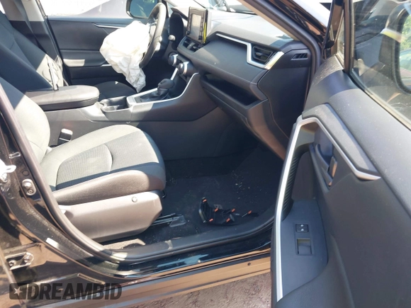 2019 Toyota RAV4 LE with VIN JTMH1RFV9KD515999, listed as a IAAI auction lot 42635692 with 87,345 mi miles and . Bid and sale history available at DreamBid. Image 5.