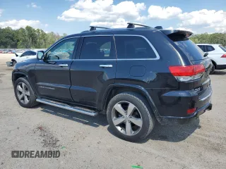 2016 Jeep Grand Cherokee Overland with VIN 1C4RJFCM9GC302353, listed as a Copart auction lot 58789604 with 87,826 mi miles and Clean title. Bid and sale history available at DreamBid. Image 2.