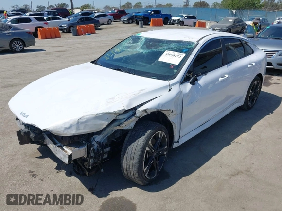 2022 Kia K5 GT-Line z VIN 5XXG64J28NG112507, wystawiony jako IAAI lot #41998172 z przebiegiem 43 915 mil mil oraz . Historia ofert i sprzedaży dostępna na DreamBid. Obrazek 2.
