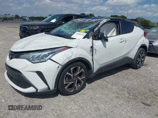 2020 Toyota C-HR LE z VIN NMTKHMBX7LR109784, wystawiony jako IAAI lot #41800460 z przebiegiem 30 514 mil mil oraz . Historia ofert i sprzedaży dostępna na DreamBid. Obrazek 2.
