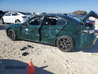 2023 BMW M5 with VIN WBS83CH02PCM33496, listed as a Copart auction lot 85286394 with 0 mi miles and Salvage Title. Bid and sale history available at carsss.com. Image 2.