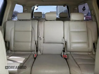 2005 Infiniti QX56 z VIN 5N3AA08C65N800718, wystawiony jako Copart lot #54229265 z przebiegiem 222 803 mil mil oraz Szkoda całkowita • Salvage title. Historia ofert i sprzedaży dostępna na DreamBid. Obrazek 10.