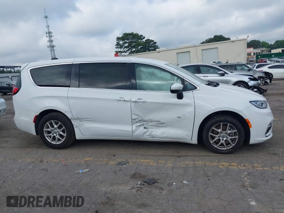 2023 Chrysler Pacifica Touring L with VIN 2C4RC1BG8PR535446, listed as a IAAI auction lot 42307923 with 65,718 mi miles and . Bid and sale history available at DreamBid. Image 13.