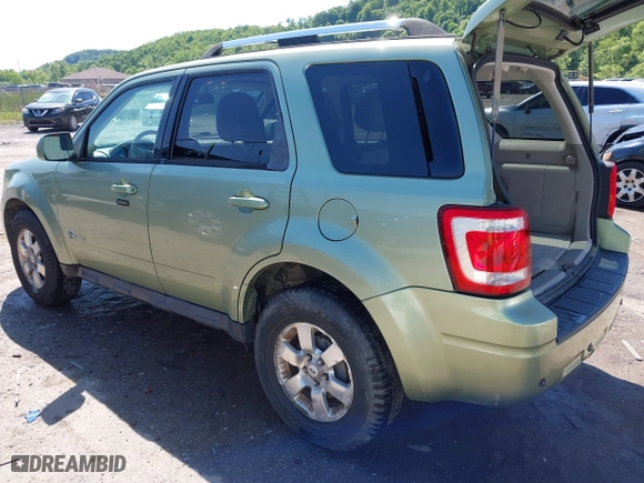 2009 Ford Escape Hybrid with VIN 1FMCU493X9KA56174, listed as a IAAI auction lot 39435925 with 158,171 mi miles. Bid and sale history available at carsss.com. Image 3.
