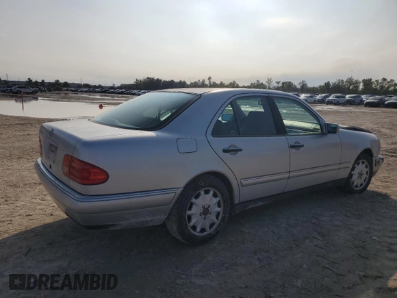 1999 Mercedes-Benz E-Class with VIN WDBJF65H9XA903481, listed as a Copart auction lot 79516914 with 201,080 mi miles and Salvage Title. Bid and sale history available at carsss.com. Image 3.