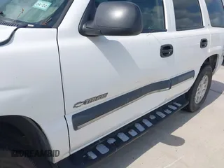 2002 Chevrolet Tahoe LS z VIN 1GNEC13Z42R214489, wystawiony jako IAAI lot #42438810 z przebiegiem 243 161 mil mil oraz . Historia ofert i sprzedaży dostępna na DreamBid. Obrazek 6.