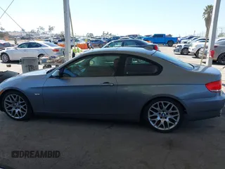 2009 BMW 3 Series 328i with VIN WBAWV13539P122930, listed as a IAAI auction lot 41970289 with 54,151 mi miles and . Bid and sale history available at DreamBid. Image 14.