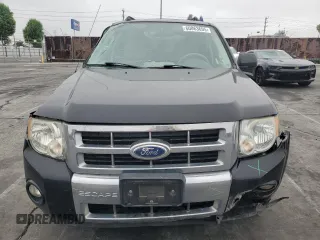 2011 Ford Escape Hybrid с VIN 1FMCU4K36BKB25314, выставлен на аукционе Copart как лот 60863695 с пробегом 165 013 миль миль и Списание • Salvage title. История ставок и продаж доступна на DreamBid. Изображение 5.