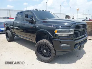 2021 Ram 2500 Laramie with VIN 3C6UR5FL7MG621346, listed as a IAAI auction lot 42419962 with 96,647 mi miles and . Bid and sale history available at DreamBid. Image 1.