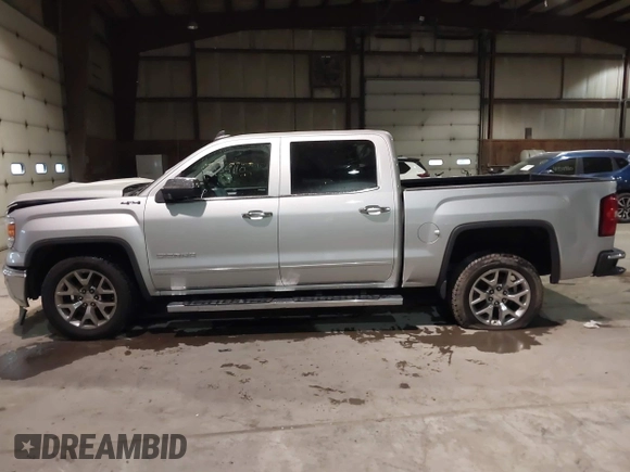 2015 GMC Sierra 1500 SLT with VIN 3GTU2VEC6FG199944, listed as a IAAI auction lot 41362346 with 152,515 mi miles and . Bid and sale history available at DreamBid. Image 14.