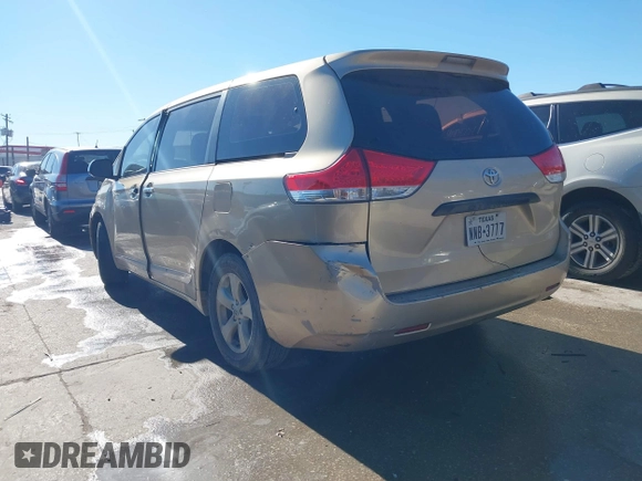 2012 Toyota Sienna with VIN 5TDKA3DC1CS011022, listed as a IAAI auction lot 41415386 with 209,552 mi miles and . Bid and sale history available at DreamBid. Image 3.